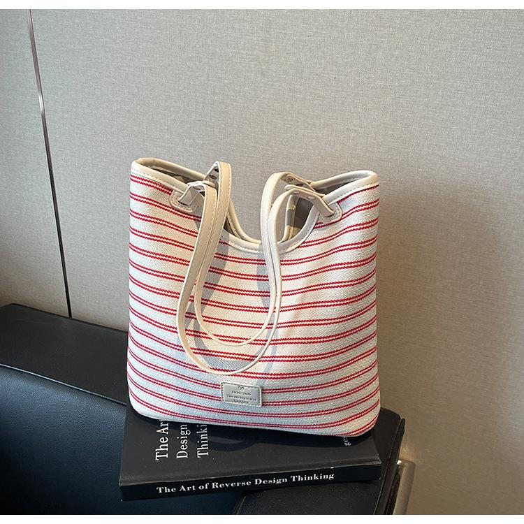 

Spring and summer large-capacity handbag bag women s new fashion plaid shoulder bag commuter tote bag розовый