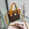 Women's bag, new spring and summer temperament, retro oblique span bucket bag, a portable underlay flower bucket