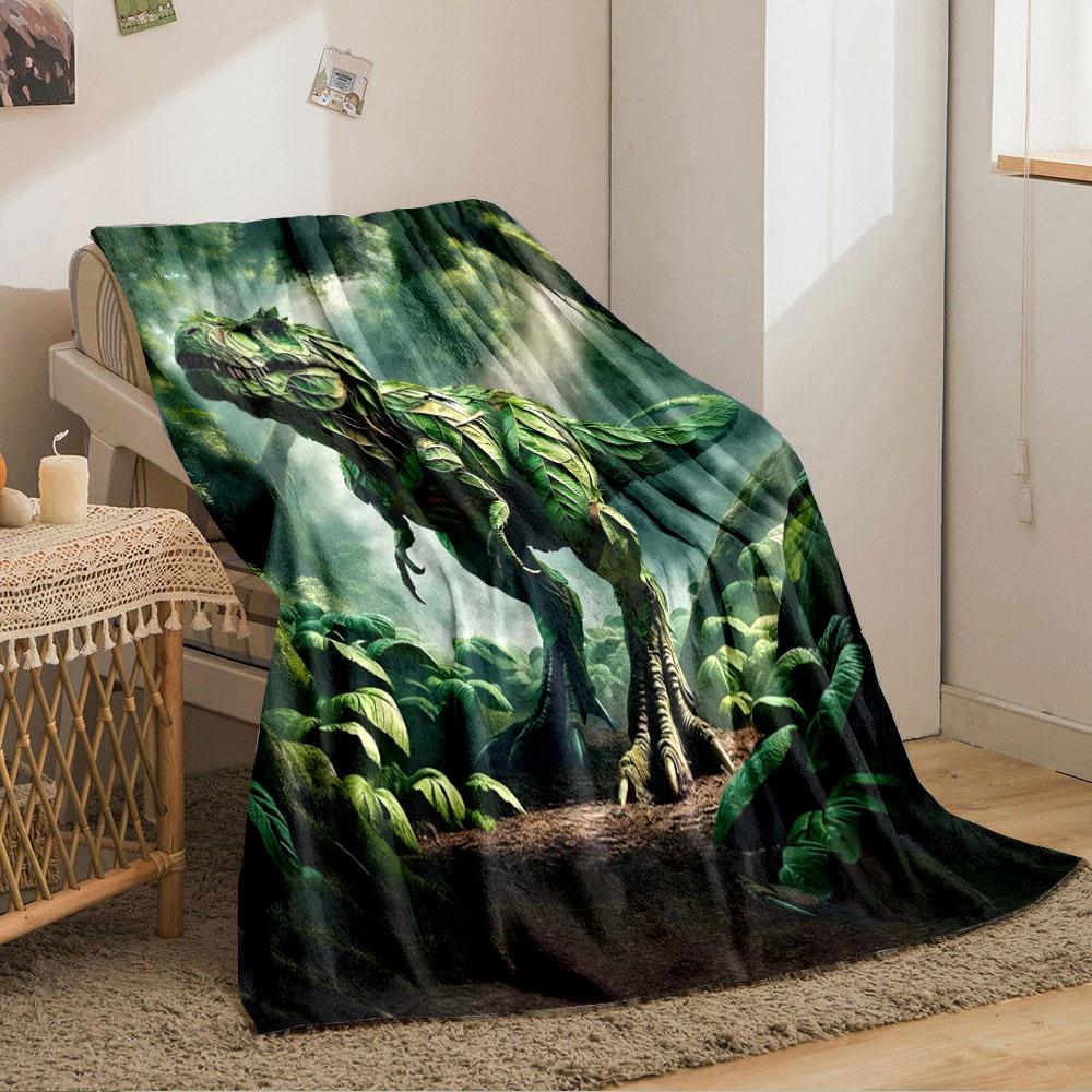 A dinosaur-shaped figure created entirely from overlapping green leaves. for all seasons blanket lunch break throw gift