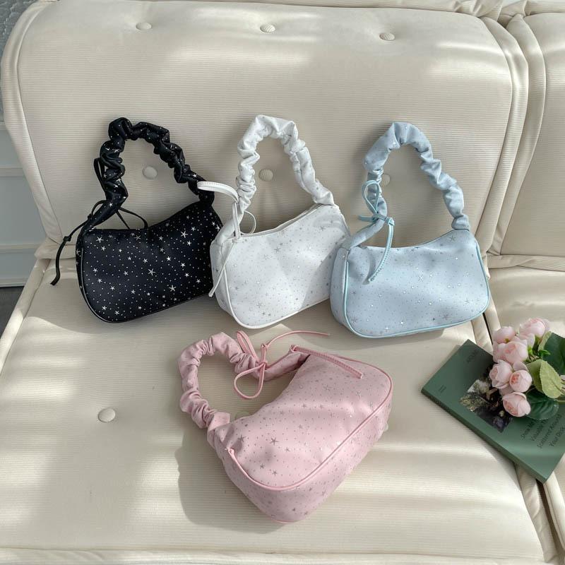Niche design star underarm bag women's new pleated shoulder bag commuter bag highend versatile canvas bag