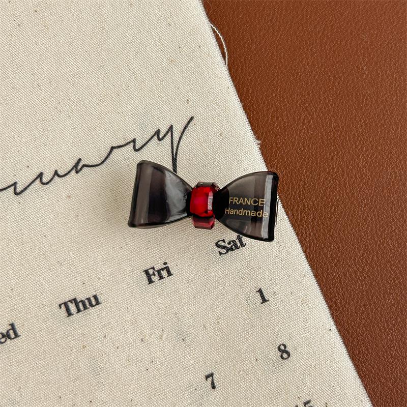 

Ретро французская золотая заколка-бантик с этикеткой контрастных цветов для детей чёрный