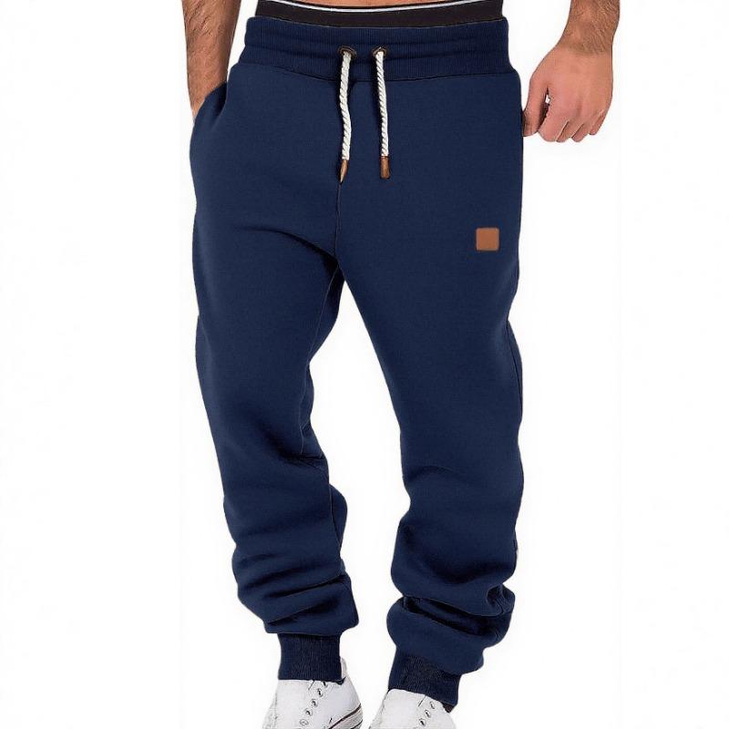 Pantalones de chándal deportivos casuales de moda para hombre de primavera otoño de color sólido, leggings holgados y pantalones de felpa