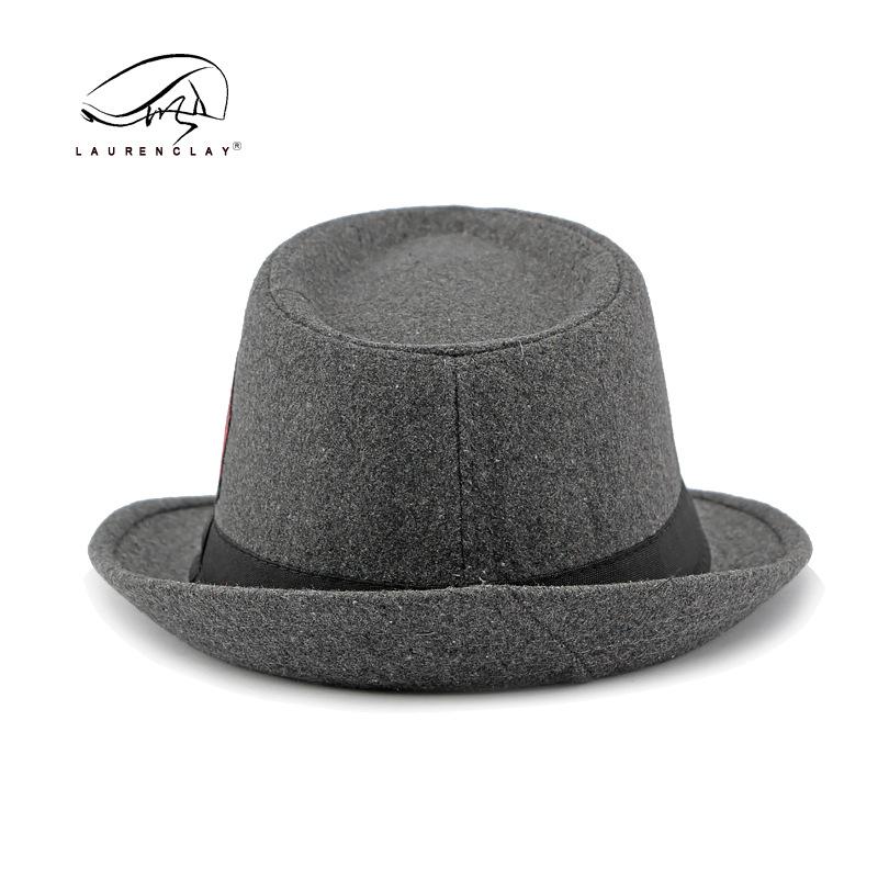 Autumn and winter new fashion personalized flower top hat women's British retro woolen jazz hat men's street performance hat