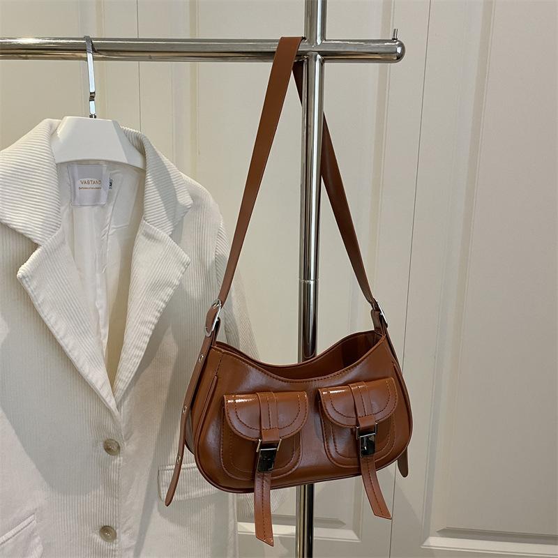 

Simple design armpit bag autumn new fashion trend versatile dumpling bag single shoulder oblique span bag коричневый