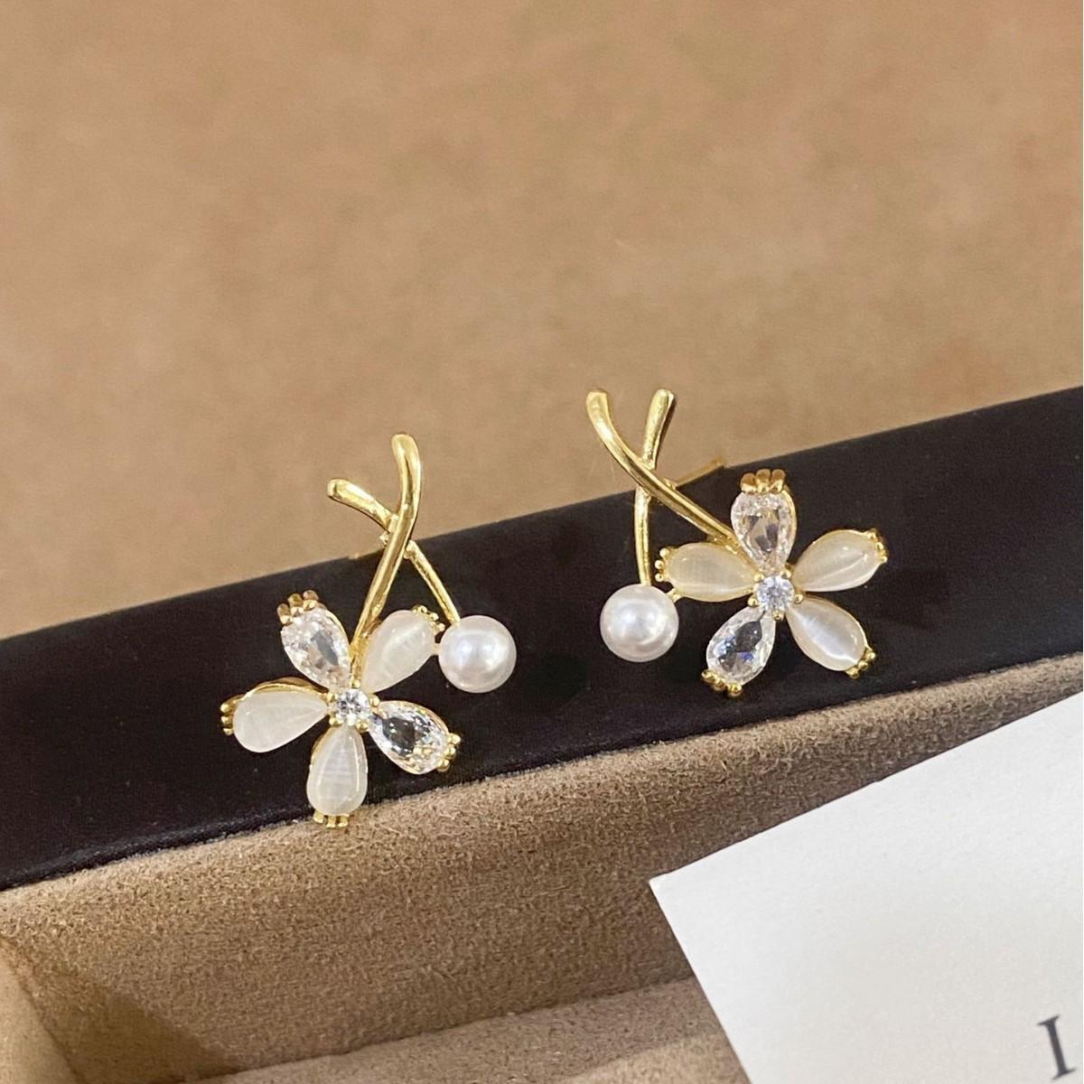 Exquisite French Cat s Eye Zirconia Flower Cross Stud Earrings: Elegant, Versatile, and Fashionable.