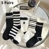 5 pairs of women's mid length stockings with a four season college style, striped sports and fashionable winter socks