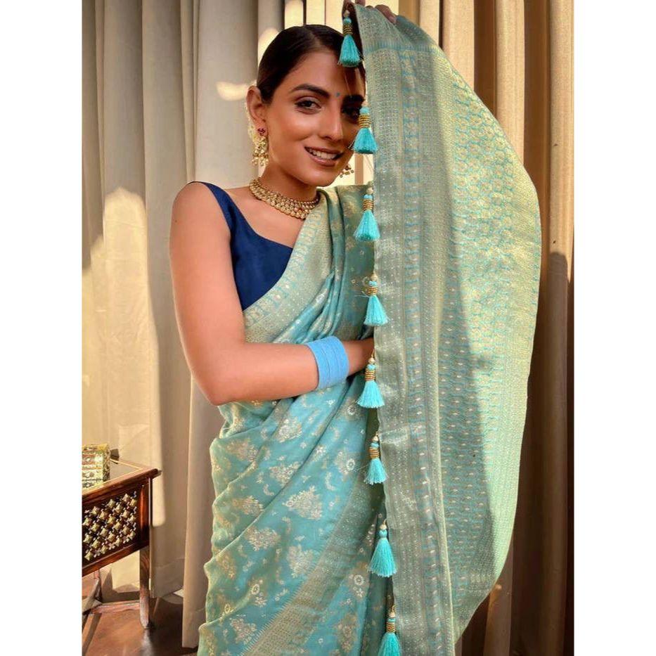 Silk Saree from the ALMAARI Store Is Adorned with Beautiful Zari Work In Form of Traditional Motifs.