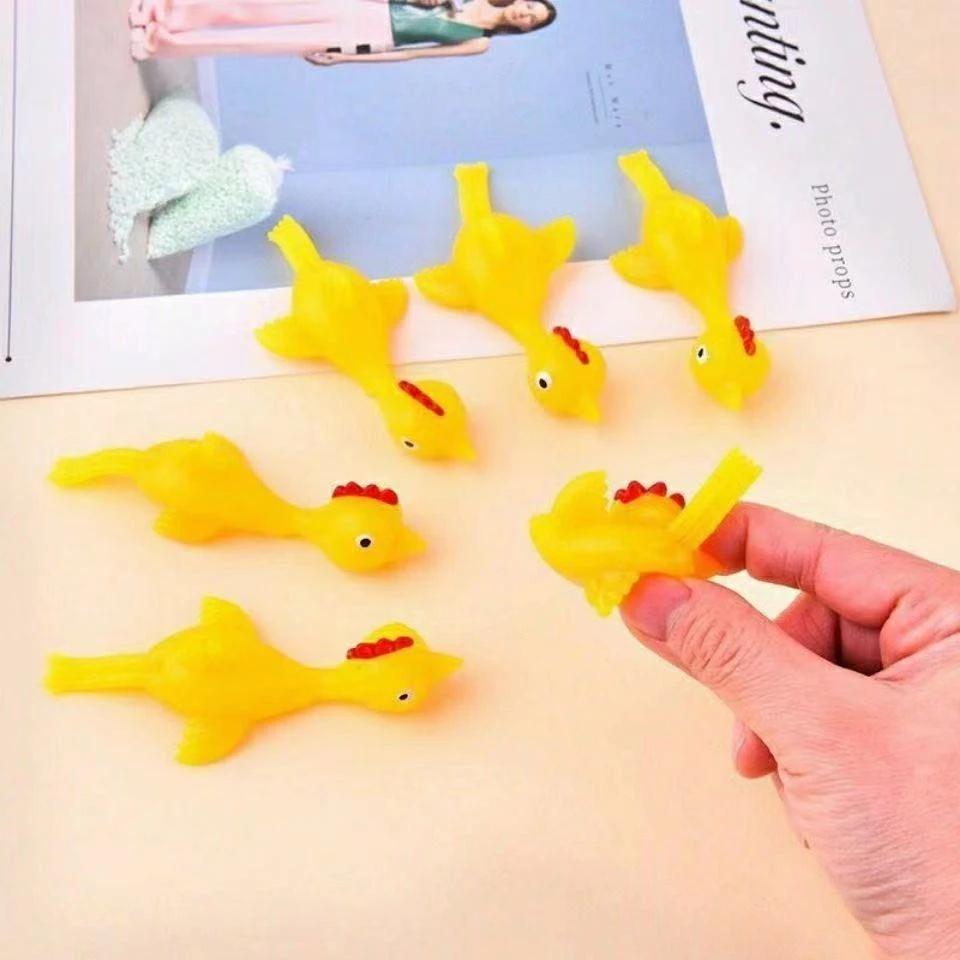 5-50pcs Novelty Catapulted Ejection Chicken Toy Light Rubber Finger Prank Flying Toy Slings Chicken Finger Toys Turkey Sticky
