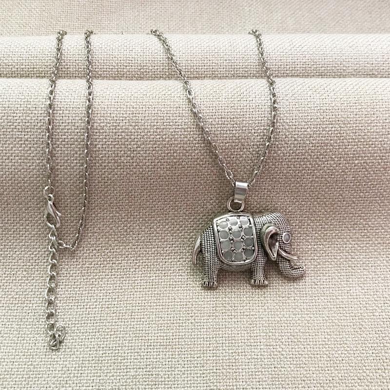 Vintage Glowing Elephant Pendant Necklace - Fluorescent Alloy Clavicle Chain with Cat and Small Elephant Charms.