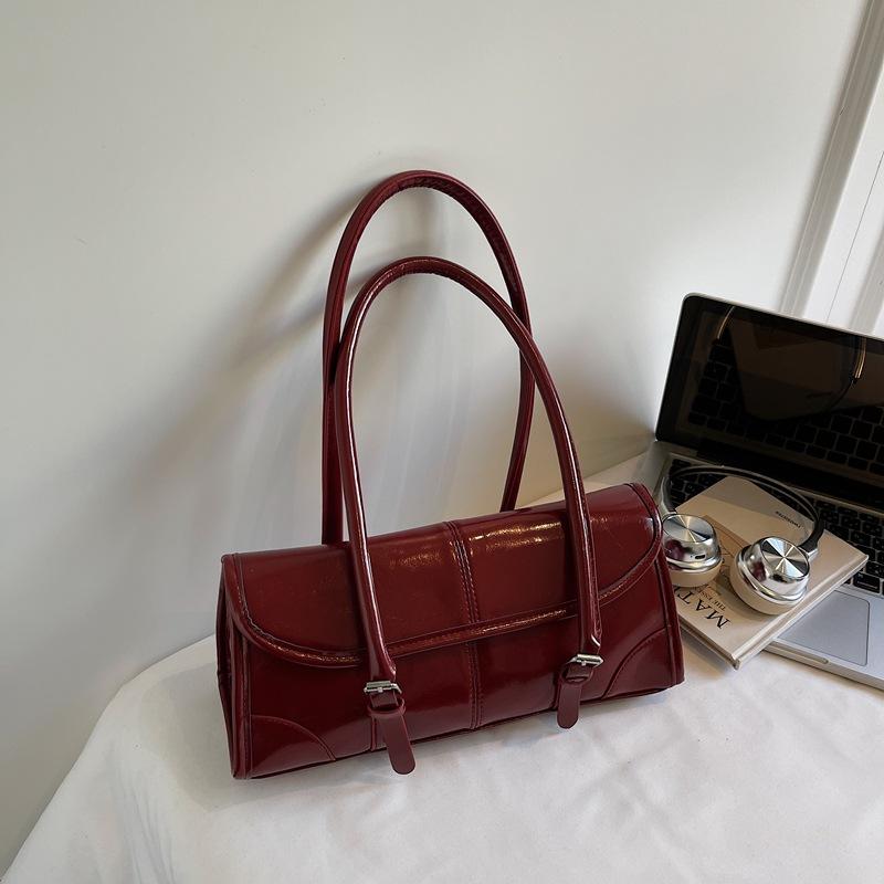 

Oil wax leather underarm bag women s high-end niche design shoulder bag large capacity versatile long baguette commuter women s bag бордовий