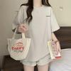 Trendy Summer Two-Piece Running Set: Loose Fit Short-Sleeve Top & Slimming Shorts for Female Students