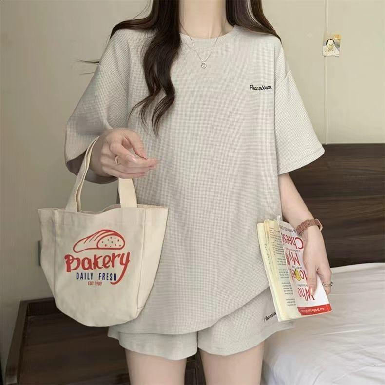 Trendy Summer Two-Piece Running Set: Loose Fit Short-Sleeve Top & Slimming Shorts for Female Students