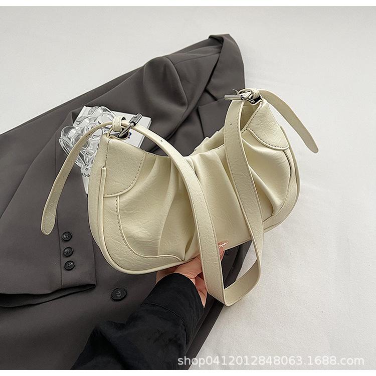 

Французская нишевая маленькая сумка под мышкой женская 2025 новая корейская версия ins плиссированная сумка-мессенджер зарубежная дорожная сумка на плечо