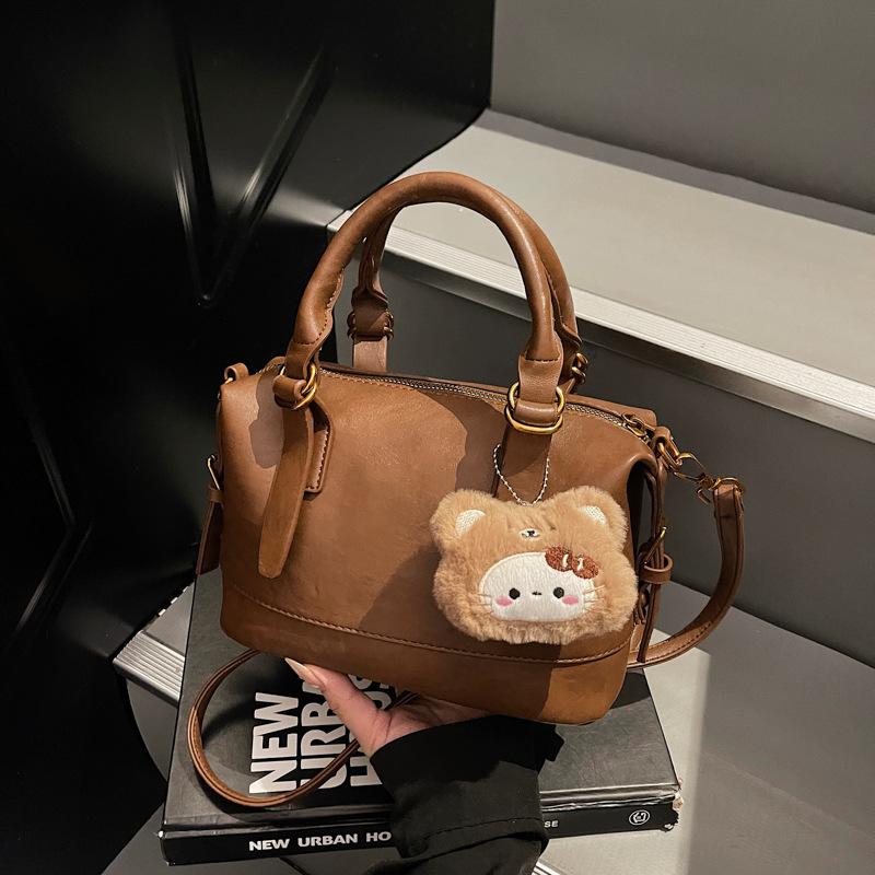 

Korean version of high-end soft leather Boston bag women s commuter handbag 2025 new foreign style shoulder messenger bag no pendant