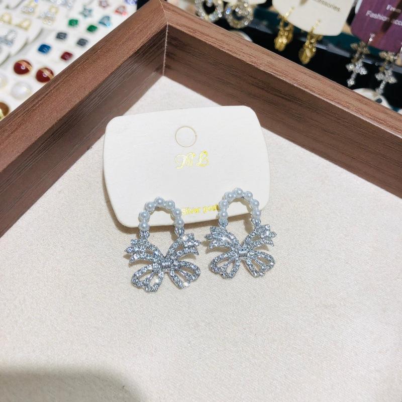 

Exquisite Rhinestone Earrings Hollow Bowknot Elegant Pearl Earrings Women s Fashion Accessories Niche