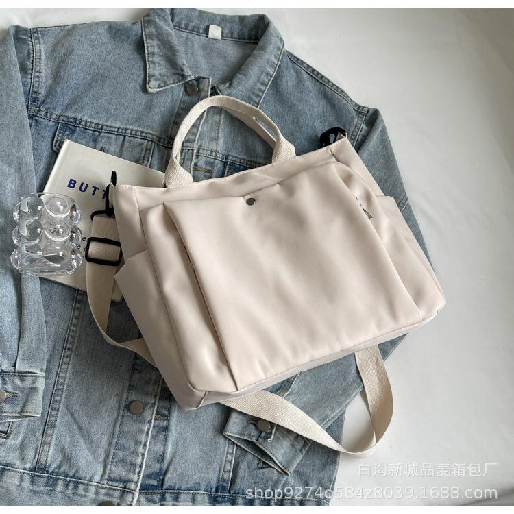 Large capacity canvas bag women's 2025 autumn and winter new casual shoulder bag simple class commuter messenger tote bag