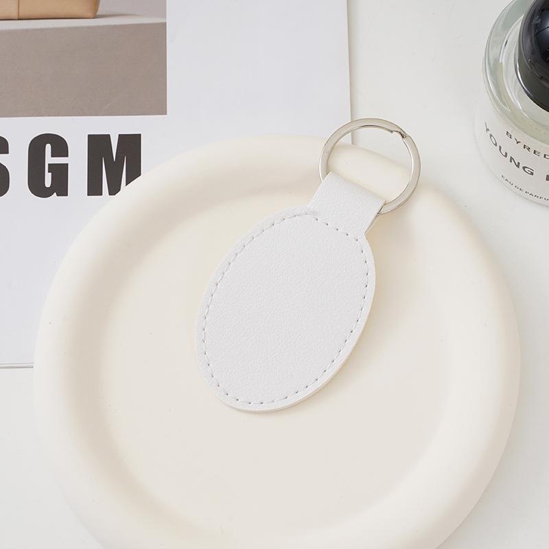 Trendy Multi-color PU Leather Keychain - Minimalist Oval Design for Men and Women
