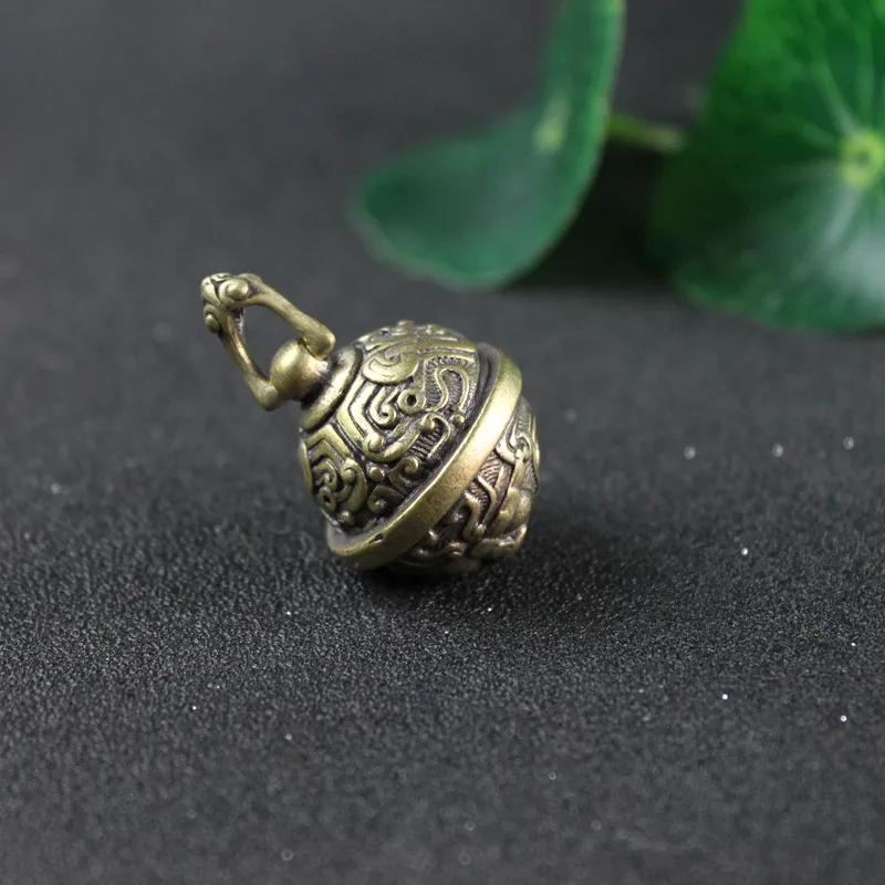 

Чистая латунь Мифическое существо Лицо Колокольчик Брелок для ключей автомобиля Подвеска Ювелирные изделия Ретро Металл Удача Фэн-шуй Животное Музыка ветра Брелок Подвеска
