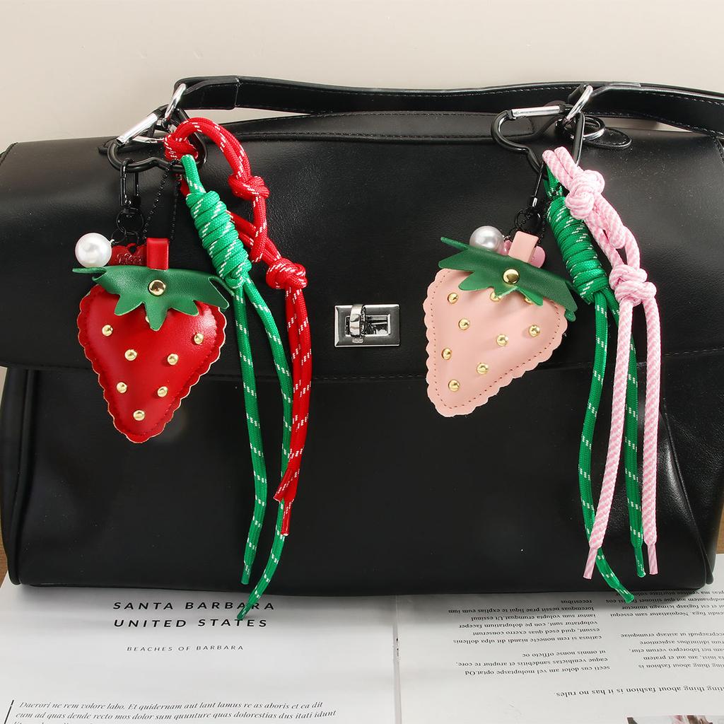 Cute leather strawberry pendant keychain braided rope love mobile phone chain bag pendant advanced sense