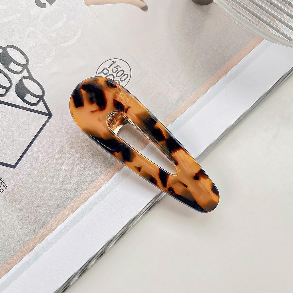 Barrette à cheveux en acrylique imprimé léopard: Barrette à frange rétro haut de gamme pour femmes