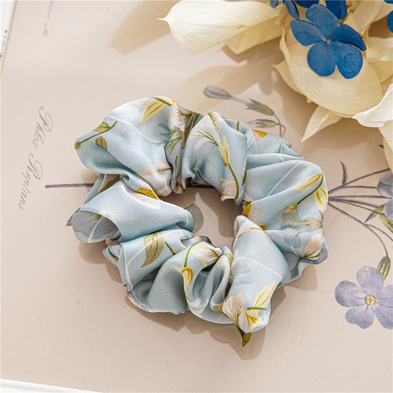 French-style smooth satin scrunchie with floral pattern, versatile elastic hair tie for women, popular on Instagram