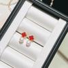 Chic Celebrity Style Four-Leaf Clover Earrings: Trendy White Dangle with Retro Pearl and Niche Design for Women