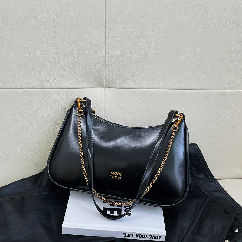 

2025 новая ретро и красивая модная портативная сумка-полумесяц, французский стиль, нишевый дизайн, повседневная на плечо, сумка-мессенджер чёрный