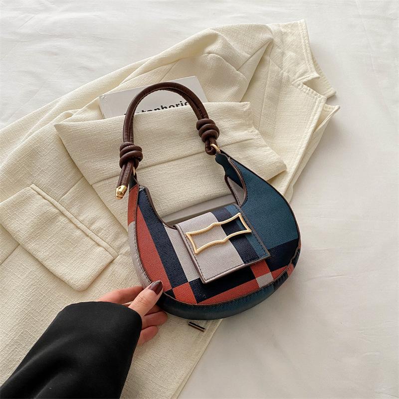 

Fashion personalized contrasting color small square bag, new trend texture shoulder underarm bag, spring dumpling bag синій