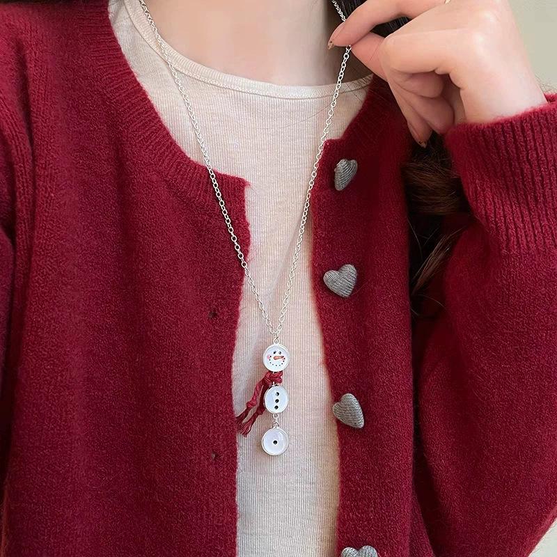 Elegant Silver Heart Pendant Necklace for Women - High-End Titanium Steel with Drawstring Long Sweater Chain, Perfect for Autumn and Winter.
