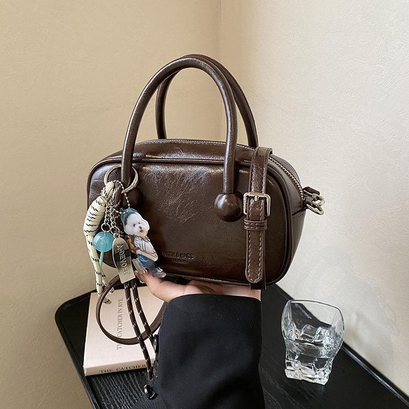 Hand-held bowling bag 2025 new fashion simple shoulder bag high-end niche women's bag