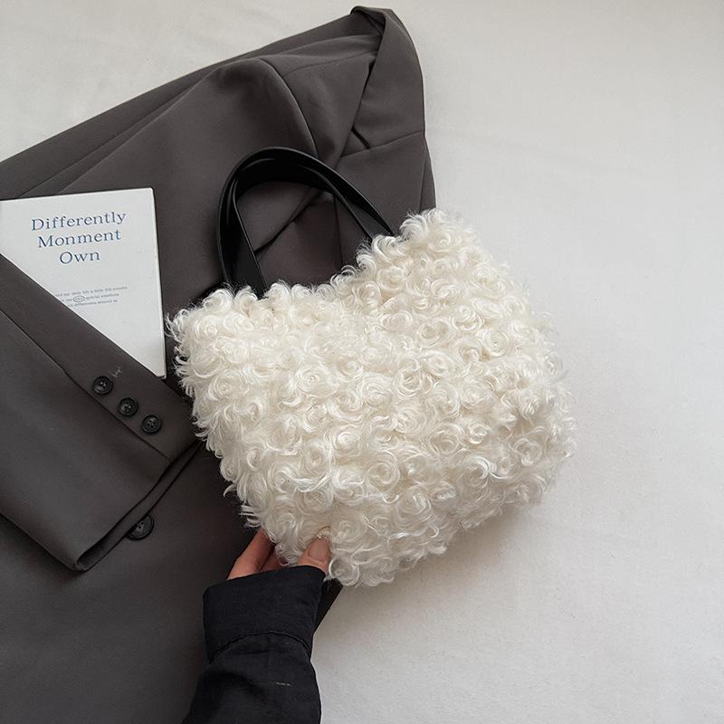 Fashion plush bucket handbag autumn new niche daily solid color simple wind handbag