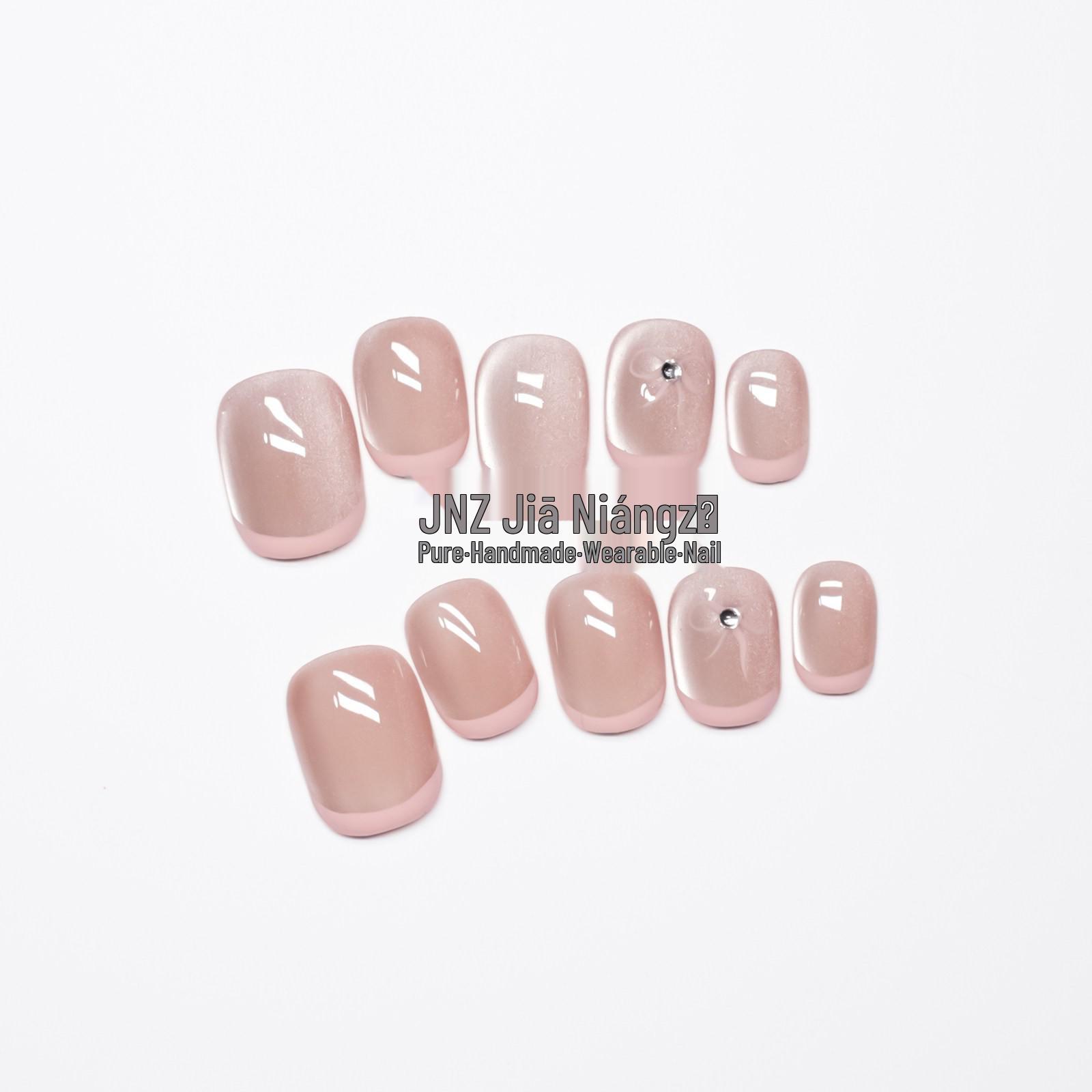 

Jia Niangzi Handmade Short French Cat Eye Nails in Nude Pink with Exquisite Bow Design 10 pieces XS (includes toolkit)