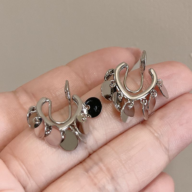 

Маленький серебряный колокольчик Девичий стиль Украшение Мода Клипса для ушей от комаров Mosquito coil ear clip a pair