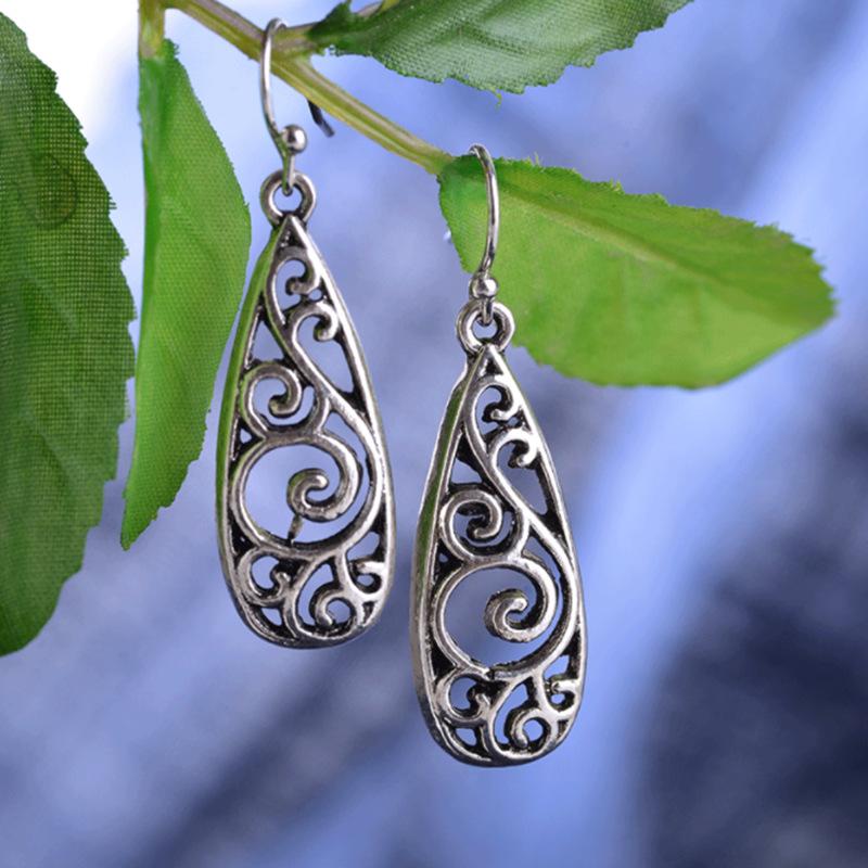 European and American Retro Carved Palace Earrings Ethnic Style Hollow Pattern Earrings 1CM*3CM