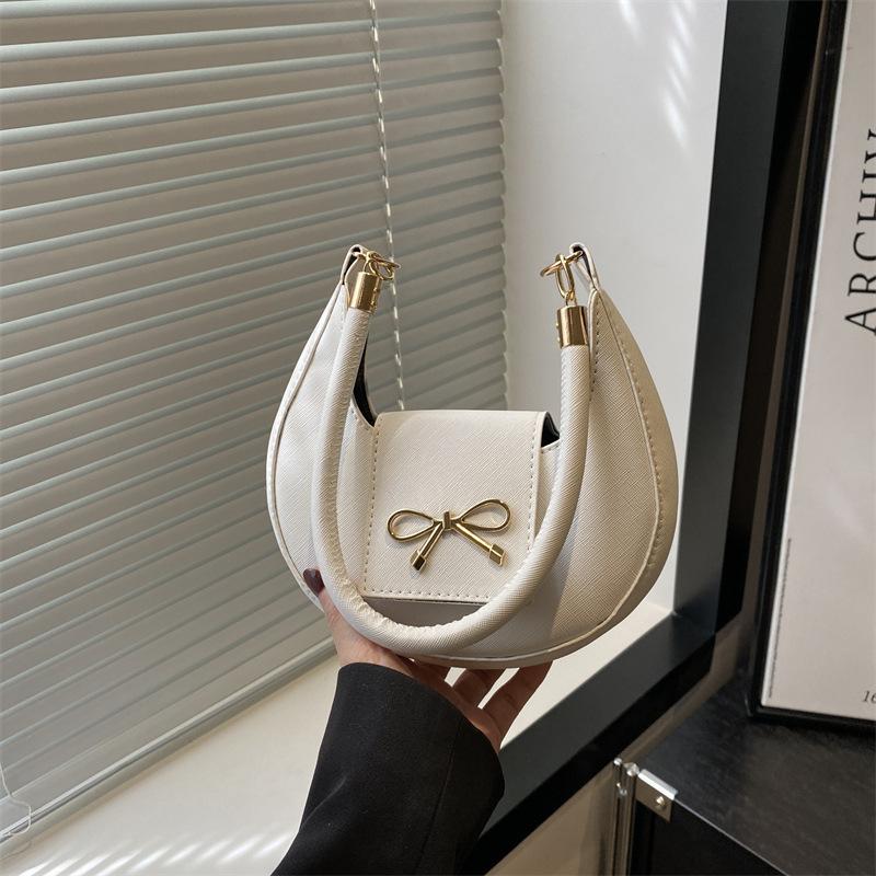 

Beautiful simple casual retro solid color summer new bow fashion design single shoulder armpit crescent bag белый