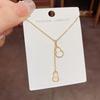 Exquisite 2025 Niche Double Gourd Tassel Necklace - Trendy Light Luxury Clavicle Chain for Women