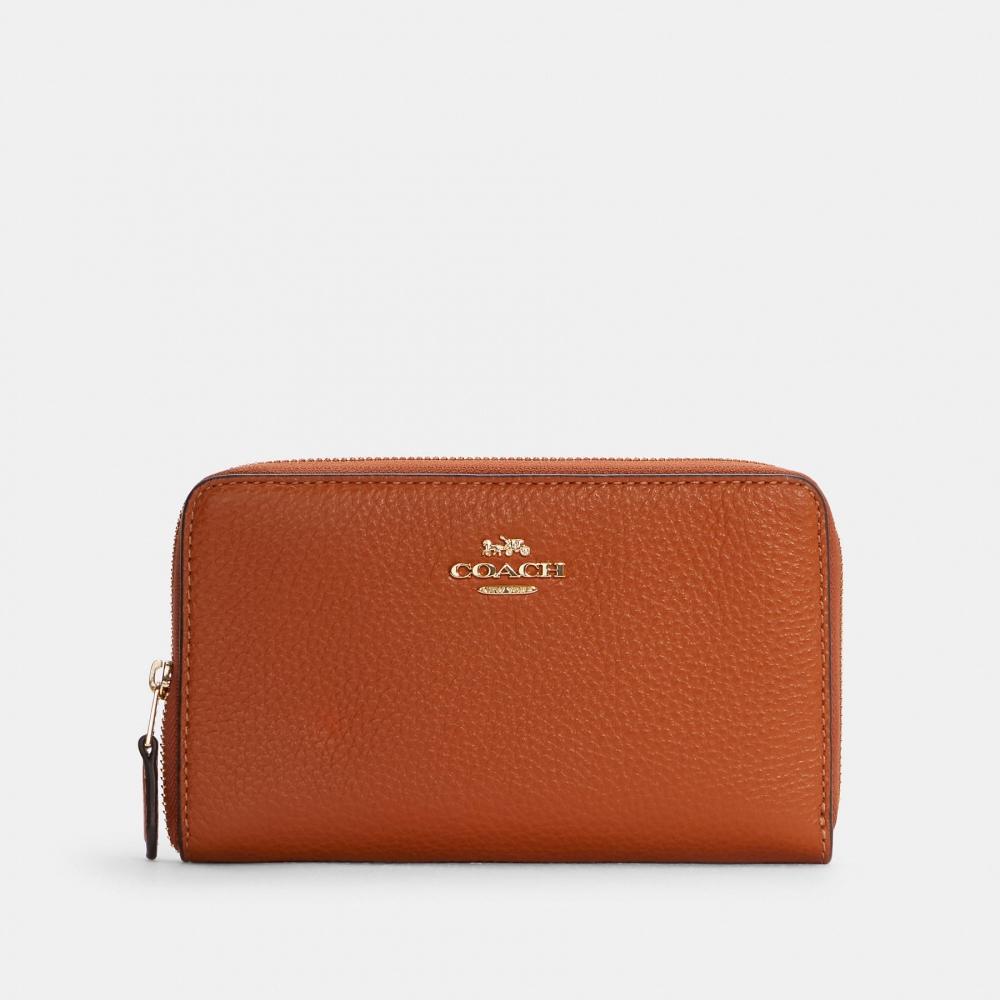 

Кошелек Coach COACH среднего размера на молнии