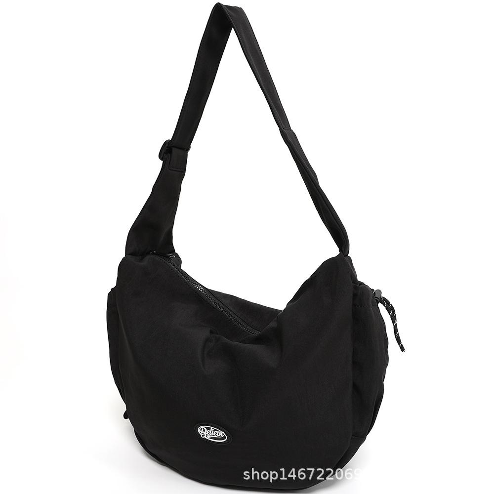 

Chaoku 2025 new nylon cloth messenger bag, the same style for men and women, fashionable commuting large-capacity dumpling bag, shoulder bag.