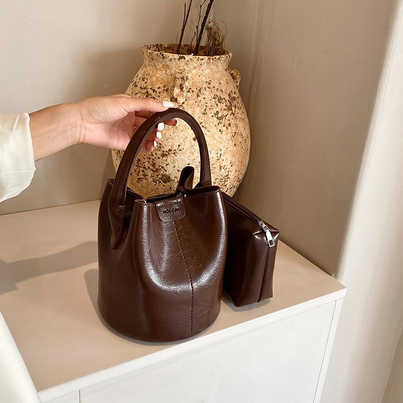 Retro Water Bucket Bag Female New Trendy Commuter Crossbody Bag Fashion Solid Color Handheld One Shoulder Bag For Women
