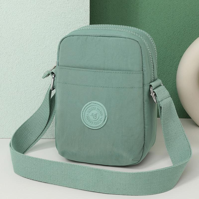 Compact Nylon Crossbody Bag with Double Zipper Closure Adjustable Strap Small Casual Purse for Daily Travel