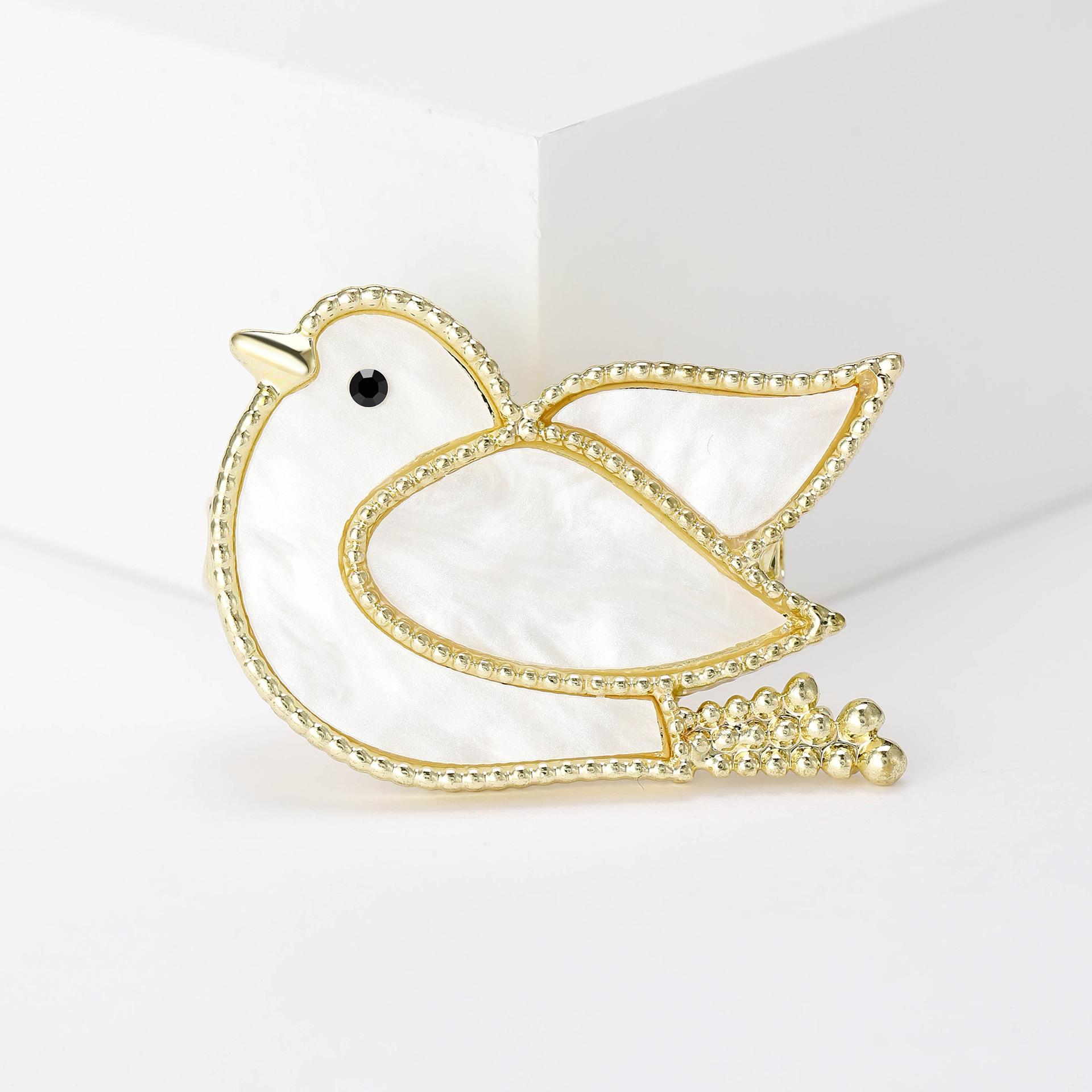 

Корейская версия мультфильма милый голубь грудь цветок креативная ракушка и голубь мира брошь для мужчин и женщин элегантный костюм булавка золотой