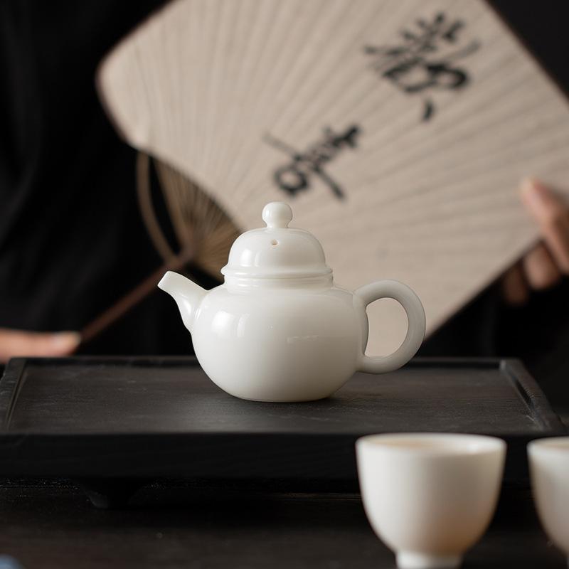 Suet jade white porcelain teapot Household tea brewing teapot Chinese ceramic Xishi pot Kung fu tea set Single pot