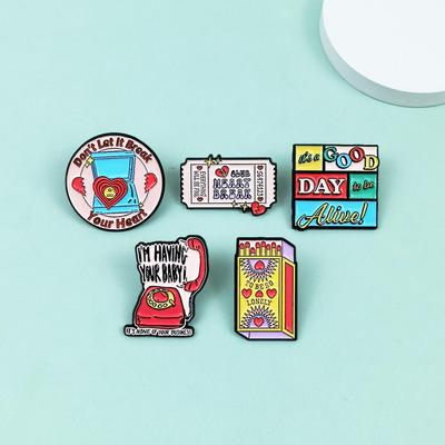 Aparatos de costura y tejido – Insignias