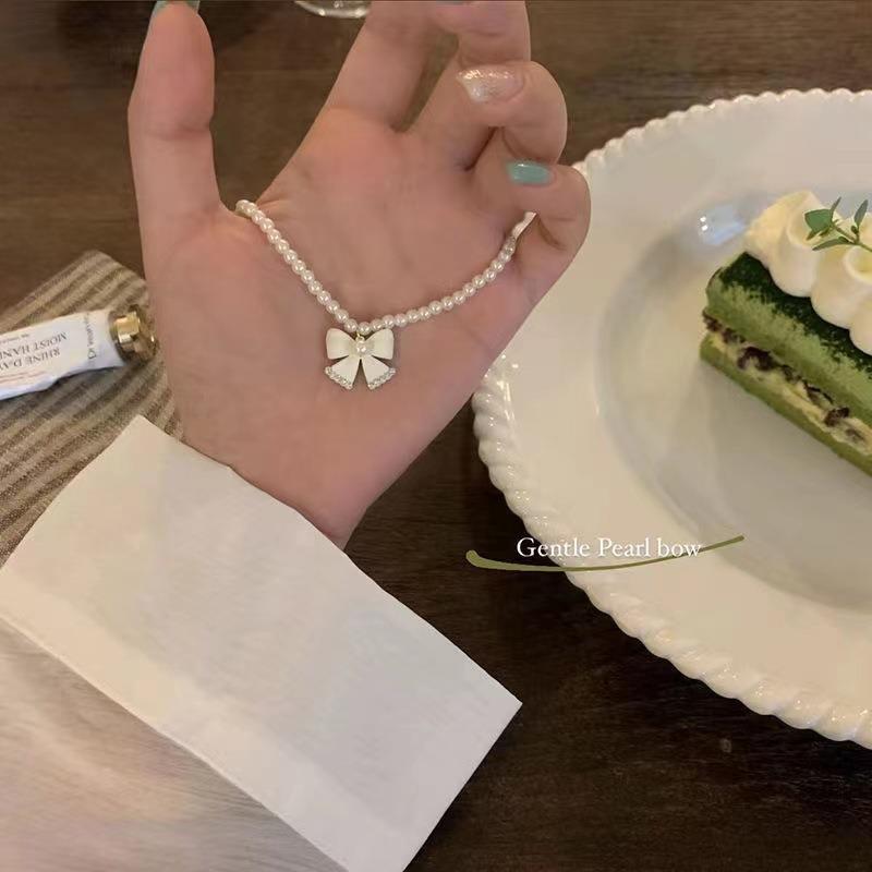 Pearl bow necklace women's summer senior design sense niche beaded collarbone chain neck chain with jewelry