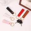 Creative Minimalist PU Leather Keychain: Solid Color Car Anti-Lost Pendant and Bag Accessory