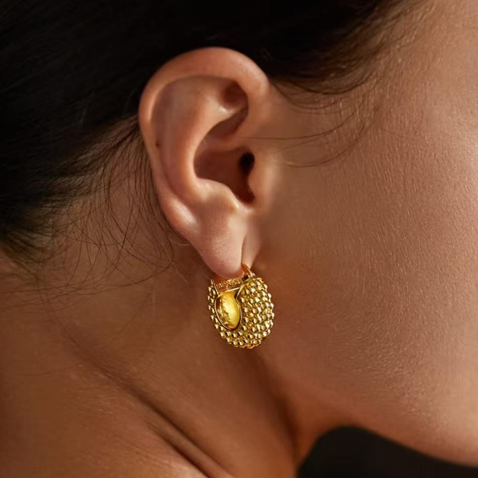 

Geometric Gold-Plated Brass Earrings with Textured Particle Design