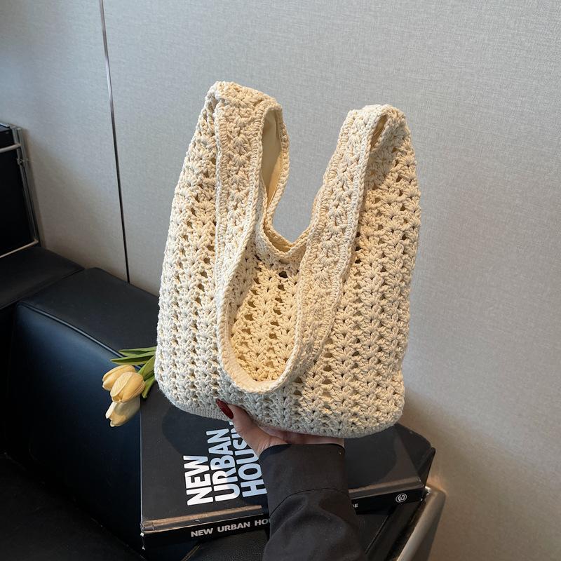 Woven bag women's large-capacity new casual shoulder armpit bag knitted seaside vacation beach bag