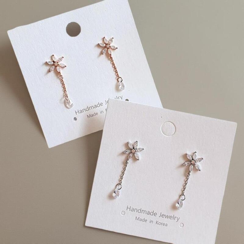 

Simple cubic drop earrings with flower design for women pink gold