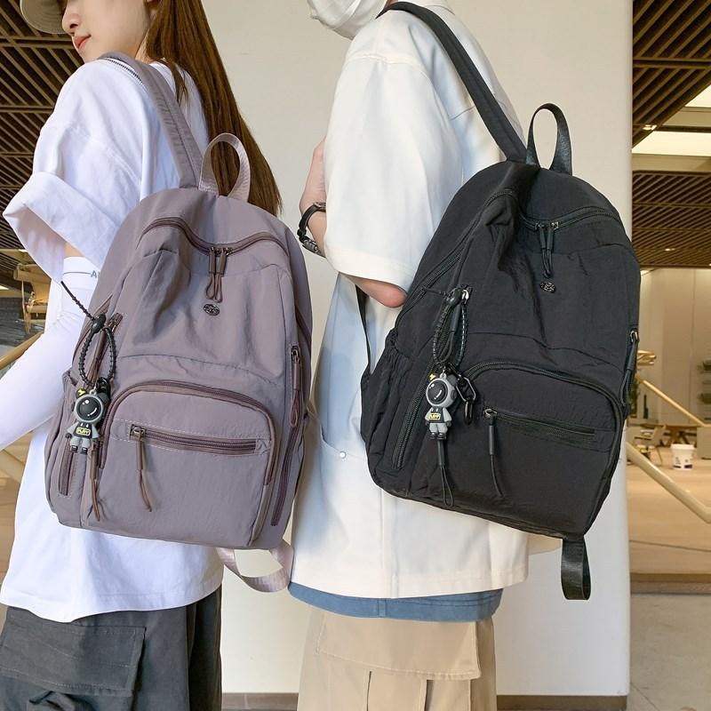 Lightweight schoolbag female solid color water-proof multi-pocket computer commuting backpack college student class travel backpack