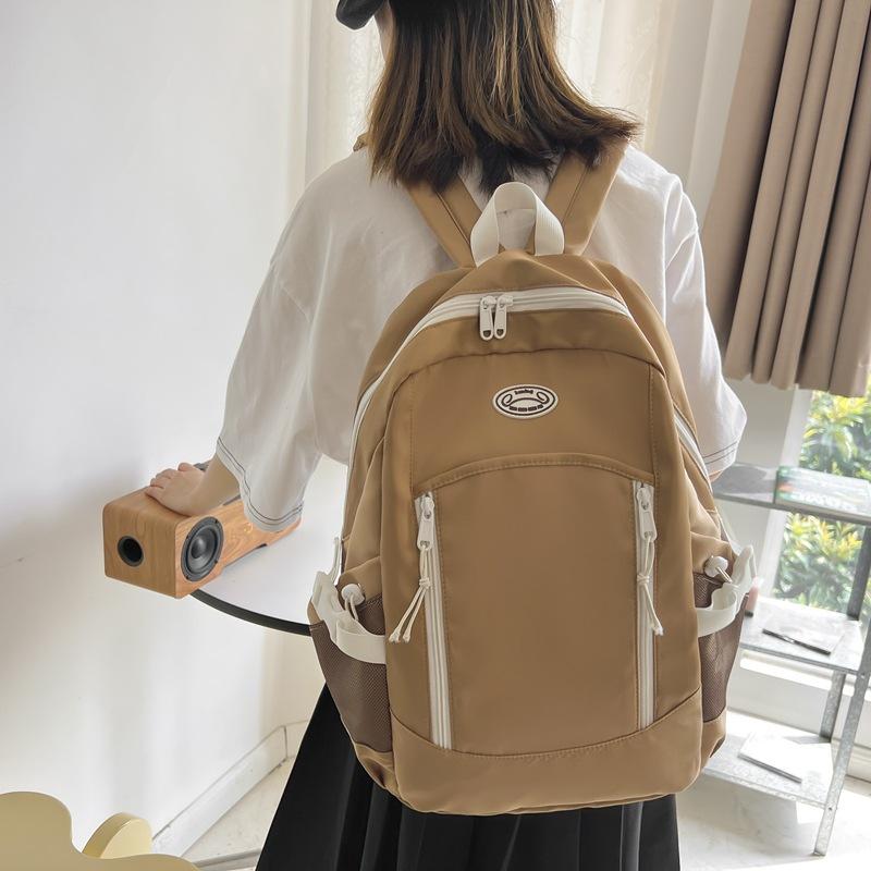 

Student schoolbag female Korean version simple vertical zipper large capacity junior high school student backpack хаки